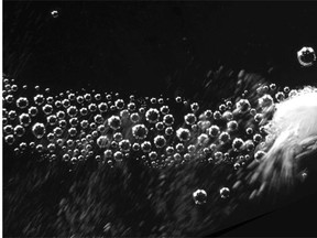 A carbonate particle is propelled through liquid by the explosive release of carbon dioxide gas, a promising mechanism to drive medication deep into a bleeding wound.
Photograph by: James Baylis