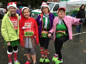 They called this their signature warm-up moves before Saturday's Santa Shuffle and Elf Walk at Ellwood Park in Abbotsford. More than 400 took part in the fun charity event.