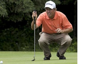 Jim Rutledge lines up a shot during a 2009 Canadian Tour event in Edmonton. (Walter Tychnowicz, Postmedia News files)