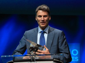 Mayor of Vancouver, Gregor Robertson, speaks after receiving an award in the category of "Carbon Measurment and Planning" during the C40 cities awards ceremony, in Paris, Thursday, Dec. 3, 2015. The C40 cities awards recognize cities for their leadership in tackling climate change across key sectors. (AP Photo/Thibault Camus)