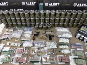 Cash, drugs and guns seized by ALERT in investigation of Surrey Boys