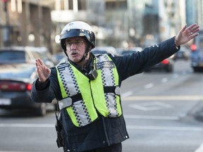 Christopher Richardson, chartered accountant by day, Vancouver School Board trustee by night, and Vancouver Traffic Authority cop by choice. Jason Payne (PNG)