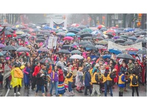 The 26th Annual Women’s Memorial March makes it way down Main Street in Vancouver, B.C. Sunday February 14, 2016.