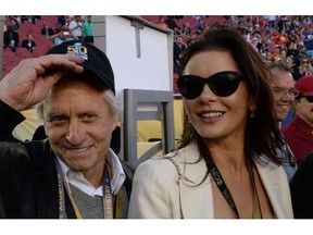 Actors Michael Douglas and Catherine Zeta-Jones arrive at Levi Stadium for Super Bowl 50 between the Carolina Panthers and the Denver Broncos in Santa Clara, Calif., on Sunday, Feb. 7, 2016.