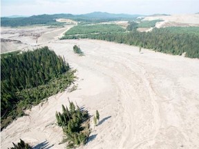A aerial view shows the damage caused by a containment facility breach near the town of Likely, B.C. in August 2014.
