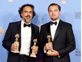 Alejandro Gonzalez Inarritu, left, and Leonardo DiCaprio pose in the press room with the award for best motion picture - drama for ìThe Revenantî at the 73rd annual Golden Globe Awards on Sunday, Jan. 10, 2016, at the Beverly Hilton Hotel in Beverly Hills, Calif.