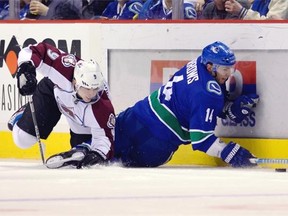 'We're in the mix and we need to put some wins together if we want to get to the playoffs,' says Vancouver Canucks winger Alex Burrows (right, in action against Matt Duchene of the Colorado Avalanche). 'We have to make sure we put it together tonight.'