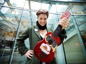 Amanda Palmer, here with her famous ukulele, reprises her TED-themed pop-up concert this week. 
 Mark van Manen/PNG