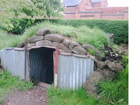 Anderson bomb shelters were common in Britain in the Second Word War. Essentially a small building made of corrugated steel, they were handed out by civil defence authorities to be erected, placed in a hole dug more than a metre into the earth and them covered with the dug-out dirt and sand bags. Fitting out the insides was up to individual families. Handout