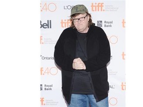 “We don’t believe in censorship in this country,” filmmaker Michael Moore says. “There can’t be any compromise on this sort of thing.” Evan Agostini/The Associated Press