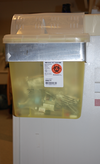 The type of biohazard waste bins (sharps containers) from which Kerri O’Keefe stole un-used drugs.