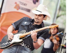 Brad Paisley is one of the top acts in country music today. He’s currently touring in support of his 2014 release Moonshine in the Trunk. Mike Coppola/Getty Images