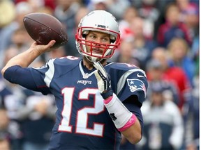 Tom Brady #12 of the New England Patriots throws during the second quarter against the New York Jets at Gillette Stadium on October 25, 2015 in Foxboro, Massachusetts.