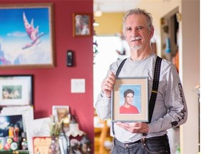 Brian Fitzpatrick holding a portrait of his son Sam, who was killed by a falling boulder while working on a construction project in Toba Inlet on Feb. 22, 2009.