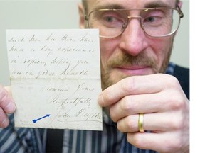 Brian Grant Duff from All Nations Stamps and Coins holds the Gassy Jack Deighton letter and signature from 1875 from the collection Gerald Wellburn