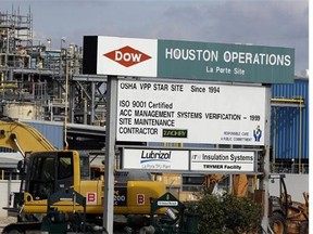 This Thursday, Dec. 10, 2015 photo shows a Dow Chemical plant in La Porte, Texas. Dow Chemical and the DuPont will attempt to merge in an all-stock deal that would create a colossal chemical producer worth $130 billion, before splitting into three separate companies. The deal announced Friday, Dec. 11, 2015 is being billed a merger of equals, to be called DowDuPont. (AP Photo/Pat Sullivan)