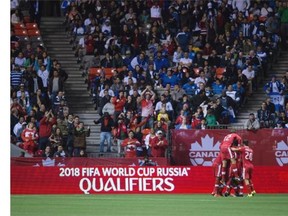 Canada’s Will Johnson is mobbed by his teammates after scoring against Honduras during first half CONCACAF 2018 World Cup qualifying soccer action in Vancouver, B.C., on Friday November 13, 2015.