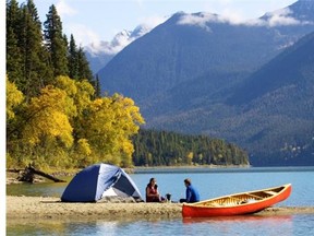 Canoe camping on the picturesque Lanezi Lake in Bowron Lake Park.