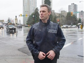 Const. Brian Montague of the Vancouver police department at the intersection of Burrard and Pacific, which is a high-accident location.