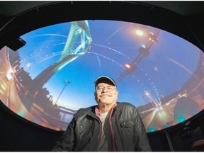 Craig McCaw showing the Lions Gate Bridge from the Dark Side Of The Moon’s laser show inside the BCIT Planetarium in Burnaby.