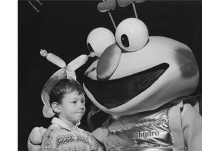 December 11, 1989. Wearing his balloon antenna Connor Corrigan,6, of East Vancouver, gets together with B.C. Hydro’s Louie the Lightning bug at the Variety Club Christmas party for disabled and disadvantaged youngsters.
