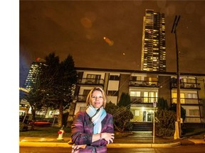 Kaye Bedford outside her rental building near metro town that is scheduled for demolition to make way for highrises in Burnaby, B.C., on December 2, 2015.