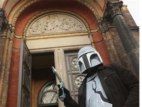 A man dressed as the Star Wars character Boba Fett arrives for a church service centered around the 1983 film Star Wars Episode VI: Return of the Jedi at the Zionskirche (Zion Church) on December 20, 2015 in Berlin, Germany. The latest Star Wars film, Star Wars Episode VII: The Force Awakens, was released in the country two days earlier, and local priests used the opportunity to tie Biblical parallels concerning good and evil to the movie, while using the original film’s score by John Williams as organ accompaniment, along with video clips.