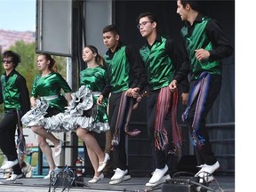 The Edmonton Metis Child and Family Jiggers perform onstage at Aboriginal Day Live in Louise McKinney Park on Saturday, June 20, 2015. British Columbia's Children's Ministry has barred a Metis toddler at the centre of a cross-country adoption battle from attending a cultural gathering that will feature Metis jiggers.