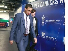 Emerson Etem, the newest member of the Vancouver Canucks, arrives at Rogers Arena with teammate Jared McCann (right) before Saturday’s game against the Tampa Bay Lightning. Etem, who was acquired in a trade with the New York Rangers on Friday, will make his debut Monday against the Florida Panthers.