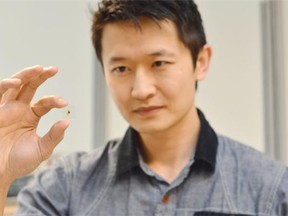 UBC engineering professor Kenneth Chau coats glass with an ultra-thin layer of metal, which makes it potentially smarter.