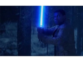 John Boyega's Finn uses a lightsaber at some point in The Force Awakens.