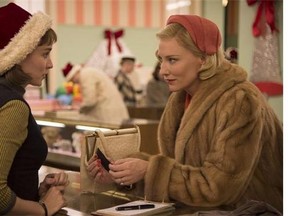This photo provided by The Weinstein Company shows, Rooney Mara, left, as Therese Belivet, and Cate Blanchett, as Carol Aird, in a scene from the film, "Carol." (Wilson Webb/The Weinstein Company via AP)