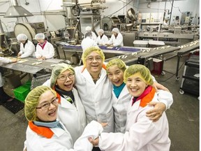 The family that runs Fine Choice Foods in Richmond. Company president Charles Lui (centre) with his wife Christina (second from left) and sisters Michelle Lui (far left), Jeanie Tang (second right) and Eileen Wong.