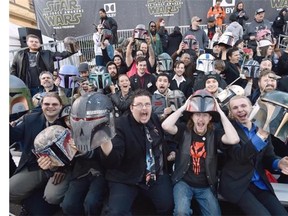 Fans cheer in the stands at world premiere of "Star Wars: The Force Awakens" at the TCL Chinese Theatre on Monday, Dec. 14, 2015, in Los Angeles.