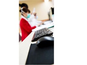 File: Close-up of a medical worker typing on computer. selective focus