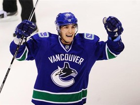 Files: Vancouver Canucks Alex Burrows 14, celebrates 3rd period goal as the Canucks battle the Arizona Coyotes in pre season NHL action in Rogers Arena in Vancouver on September 28, 2015.