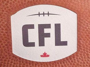 A football with the new CFL logo sits on a chair as CFL Commissioner Jeffrey L. Orridge gives his first State of the League media conference.