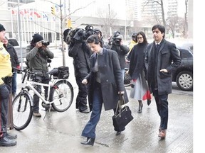 Former CBC broadcaster Jian Ghomeshi and his lawyer Marie Henein arrive at a Toronto court this week. Ghomeshi has pleaded not guilty to four counts of sexual assault and one count of overcoming resistance by choking.