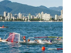 A game of water polo plays out in English Bay near Kits Beach in Vancouver on July 30, 2015.