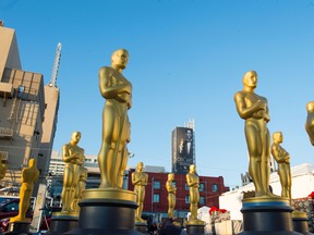 Oscar statuettes are seen as workers make preparations for the 88th Annual Academy Awards at Hollywood & Highland Center, Hollywood, California, on February 24, 2016.
 / AFP / VALERIE MACON