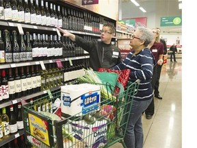 Two grocery stores in Surrey sell wine, but the rest of the province's people still await their opportunity to drop by a local grocery store and buy a loaf bread, a piece of cheese and a bottle of wine.