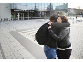 A group of current and former UBC graduate students held a press conference Sunday to complain about systemic failures at the post-secondary institution for reporting sexual assault and harassment. Caitlin Cunningham (at right, getting a hug from a supporter) alleges that she was sexually assaulted while attending the university. She said that the experience of reporting the incident, and its subsequent handling, were horrific.