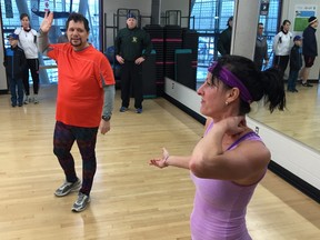 InTraining leader Arian Soheili, left, saluted Family Day on Sunday by wearing psychedelic running tights and taking part in a zumba warm-up at Walnut Grove Rec Centre. He challenged everyone to wear wild tights next weekend, which could get scary!