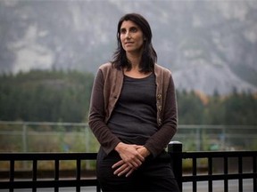 Susan Chapelle stands for a photograph in Squamish on Friday October 9, 2015. When Chapelle awoke in a stranger's home, her head pounding and her clothes on backwards, she didn't even consider reporting her rape. The British Columbia politician was 19 when she was drugged and assaulted by a man who would turn out to be a notorious serial rapist.