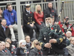 Hundreds of people braved the wet weather to take part in the annual Remembrance Day ceremonies at the Victory Square Cenotaph in Vancouver, BC Friday, November 11, 2011. Unique to this year’s ceremonies was the participation of members of the Russian navy, whose ships are currently docked in Vancouver as part of a goodwill visit.