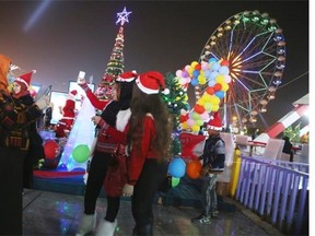 Iraqis welcome the New Year during the New Year’s Eve celebrations in a park in Basra, 340 miles (550 kilometers) southeast of Baghdad, Iraq, Thursday, Dec. 31, 2015.