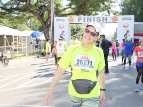 Joanne Pocock is all smiles as she completes the Honolulu Marathon in December. Pocock lost 80 pounds in her first year at Live Well and has kept it off for a second year.