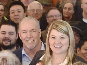 Jodie Wickens, B.C. NDP candidate in Coquitlam - Burke Mountain by-election (standing in front of NDP leader John Horgan).