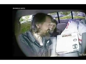 John Nuttall with a box of pressure cooker ‘bombs’ in a vehicle with Amanda Korody behind him.