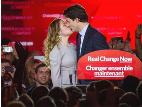Justin Trudeau, Canada’s prime minister-elect and leader of the Liberal Party of Canada, kisses his wife Sophie Gregoire-Trudeau after being elected prime minister on election night Montreal, Quebec, Canada, on Tuesday, Oct. 20, 2015. Trudeau’s Liberal Party swept into office with a surprise majority, ousting Prime Minister Stephen Harper and capping the biggest comeback election victory in Canadian history.